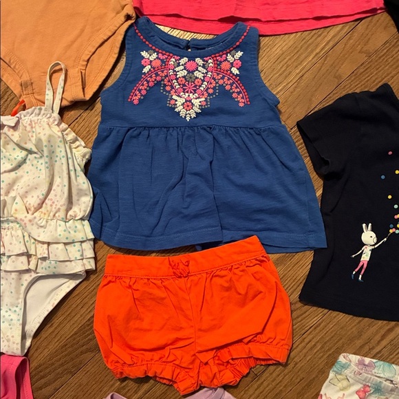 Colorful Baby Clothing Set. Includes Outfits, Tees, Onesies, Leggings, and Dress - Picture 11 of 16